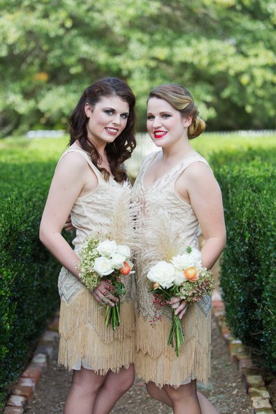 Flapper girl bridesmaids with bouquets at Parterre