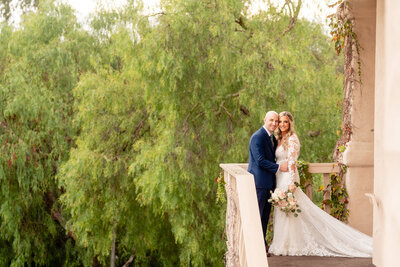 Bride and Groom standing together at their wedding at Rancho Bernardo Inn