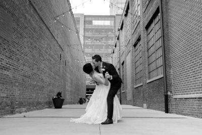 Luxury Wedding Portraits by Moving Mountains Photography in NC - Photo of a couple sitting on the ground.