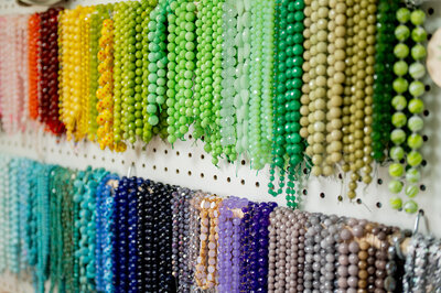 A wall of colorful beads - Bloom by bel monili