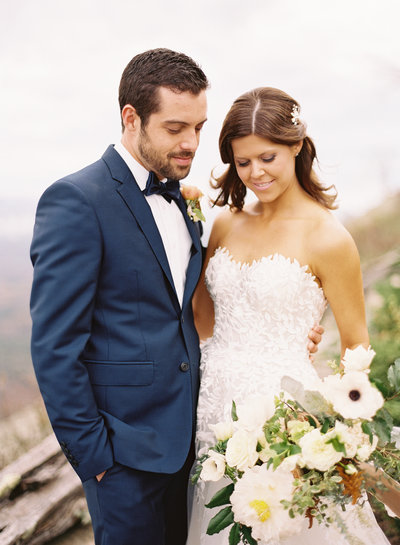 Bride in Lace Dress with Fall Garden Bouquet with Groom in Navy Tuxedo