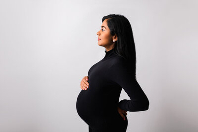 black maternity gown bold look in studio