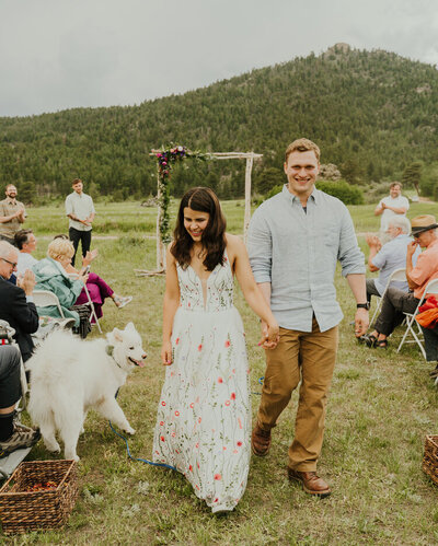 Couple walks down the aisle after getting married in Estes Park.