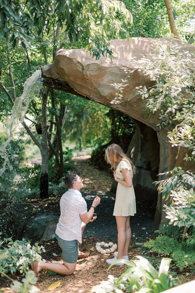 man pops the question at the best place to propose in raleigh north carolina for photographer