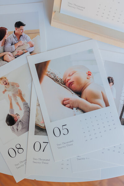 Family photos fill individual calendar pages