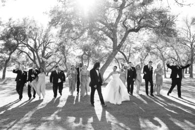 An Austin-based wedding photographer captured a timeless black and white photo of a wedding party.