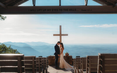 Newlyweds pose for portraits on their Wedding Day at Pretty Place Chapel in Asheville, NC.