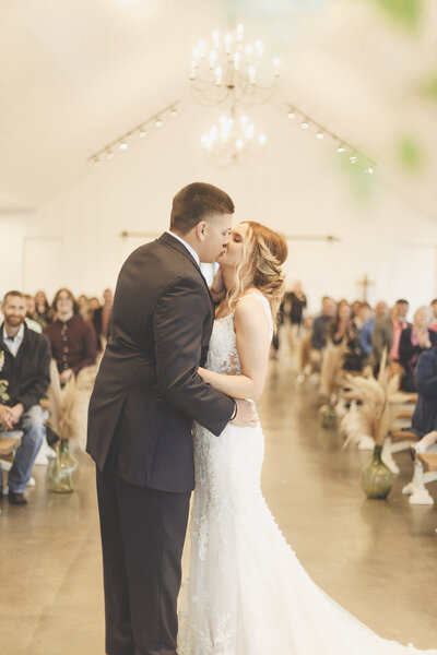 Behind the Kiss portrait  taken at  The Venue at Orchard Farms by Dallas Wedding Photographer, Arlene Stepanian