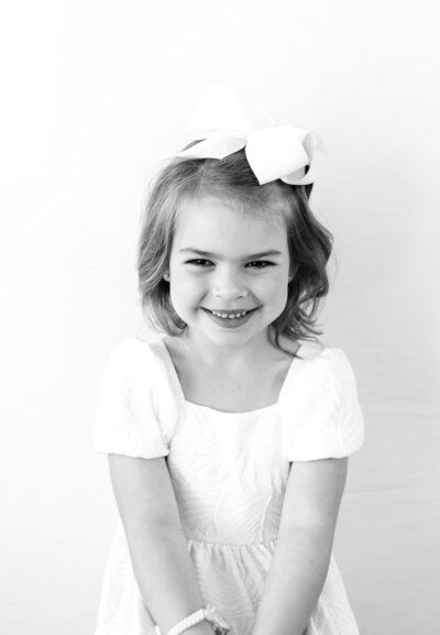 black and white personality portraits on child