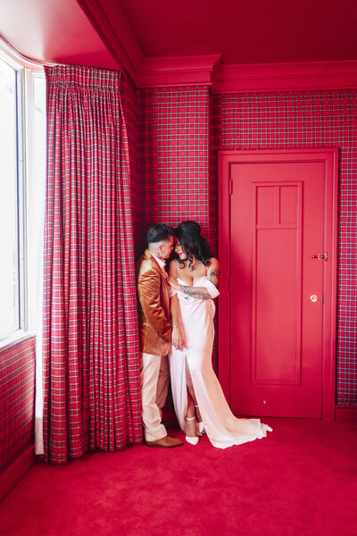 Brides Caitlin & Brenna embrace after they say "I do"