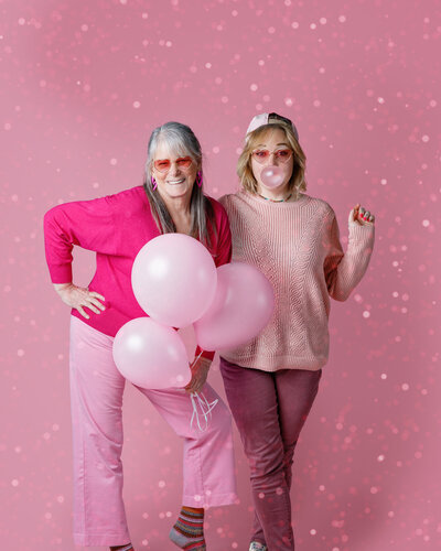 Portrait of the Life in Pinck Photography staff dressed in pink