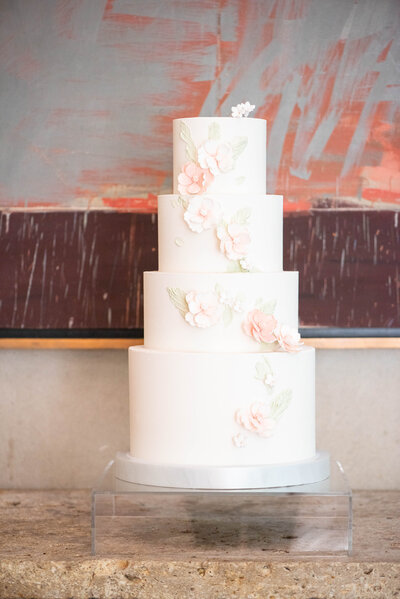 White wedding cake with decorative flowers