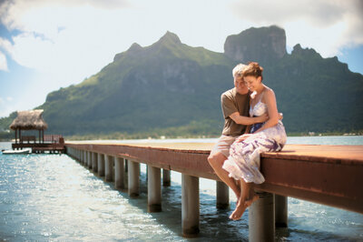 couple on dock in tahiti