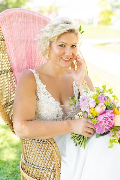 Bride relaxing on her wedding day with bright color palette.