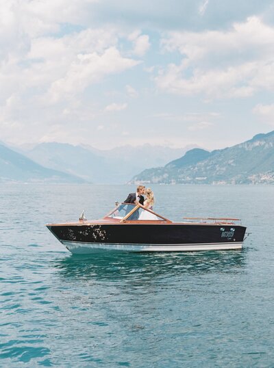 Lake Como destination wedding, couple in boat