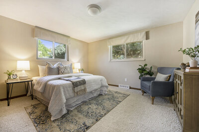 Neutral modern living room interior staged for sale in Loveland, CO real estate listing