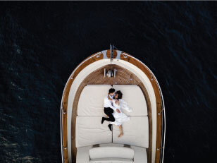 drone-shot-of-couple-on-boat