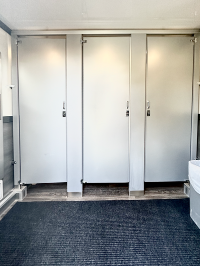 Private stalls, a hallmark of sophistication and exclusivity in our luxury mobile restroom trailers.