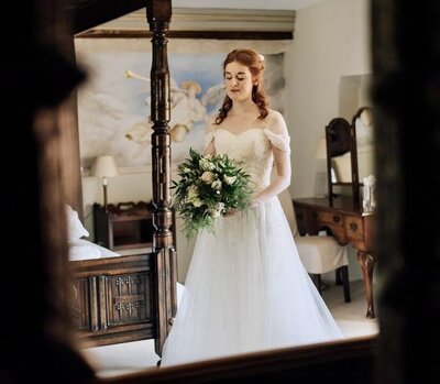 romantic bride with four poster bed
