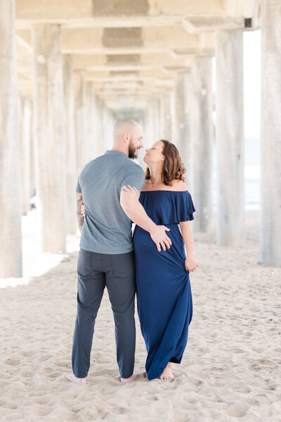 Pregnancy photoshoot, taken in Huntington Beach, California by Amy Captures Love at Huntington Beach Pier