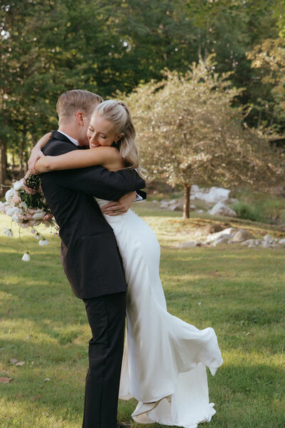 Bride holding bouquet on wedding day
