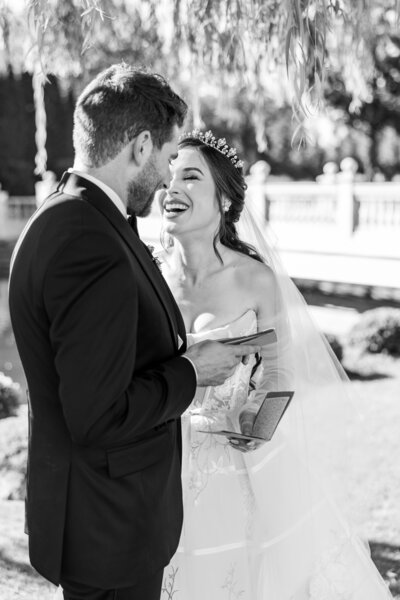 Bride and Groom Smile at Ceremony at French Chateau Destination Wedding