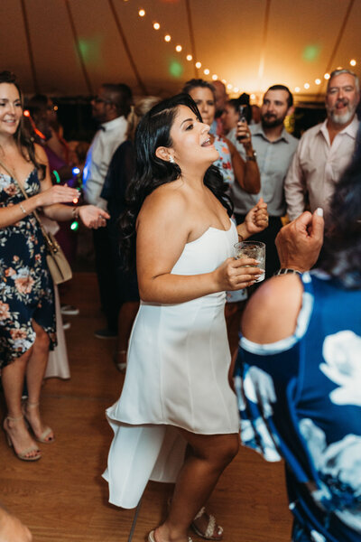 Bride dancing with guests at wedding reception, wedding at Connemarra House