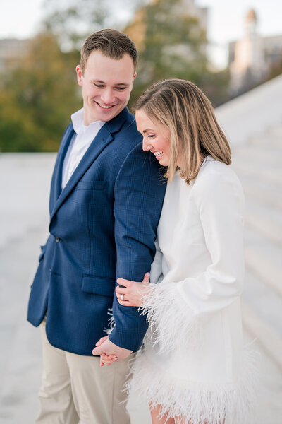 bride and groom smiling together
