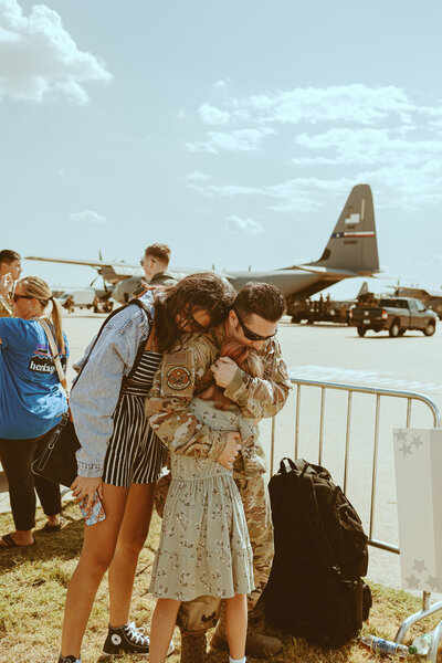 Emotional military homecoming session at Dyess Air Force Base in Abilene, TX