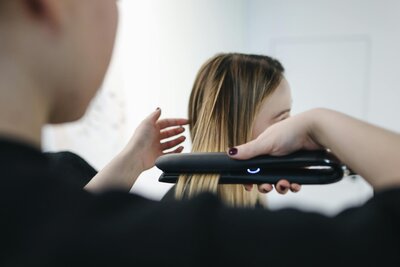 client receiving hair service