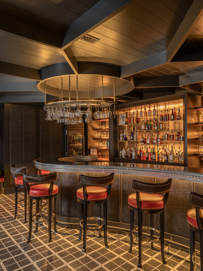 Dark and moody bar with undertone accent lighting