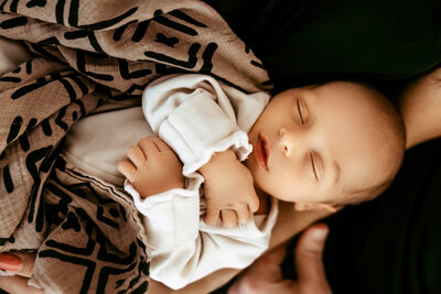 newborn baby sleeping during photoshoot in Ft. Worth TX