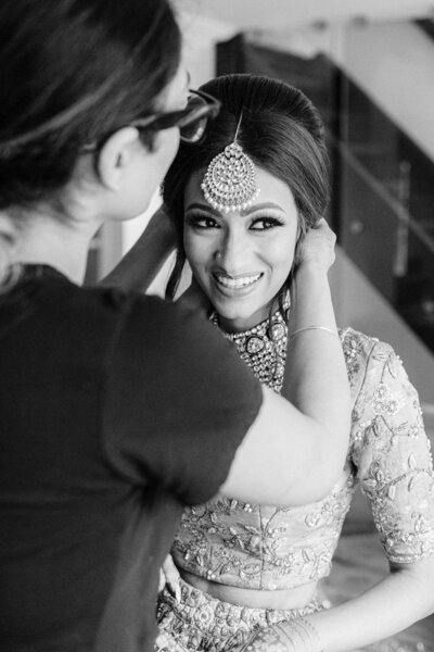 Image of Indian bride getting ready for wedding day.