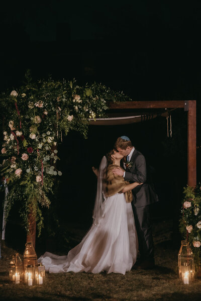 Bride and Groom kissing at wedding ceremony, Salem wedding