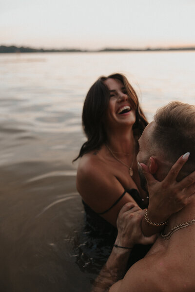 romantic engagement photos at lake in nashville, tennessee