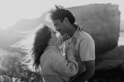 couple pose at glacier point for sunrise elopement