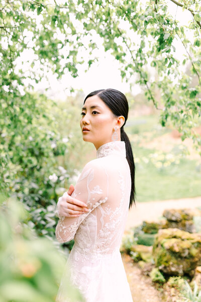 Bridal portrait in garden around green trees in traditional asian bridal gown, photo by Anastasiya Photography - Monterey Wedding Photographer, monterey wedding, carmel wedding, monterey photographer, carmel photographer