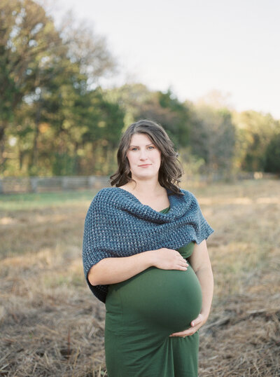 Mom looks at camera during her maternity session in Murfreesboro TN