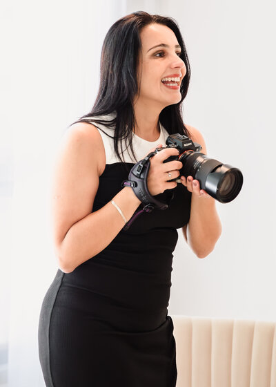 photo of a brand photographer in action with your camera