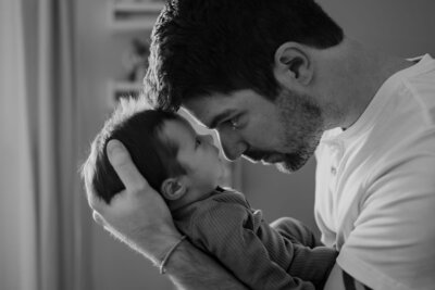 dad and baby snuggling