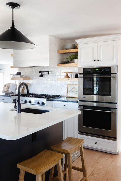 Modern Farmhouse white kitchen, tile backsplash, black island