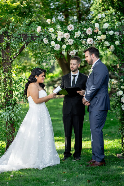 Bride reading vows to groom at ceremony, Connemarra House wedding
