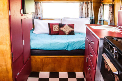Location marketing photo interior mini airstream trailer bed