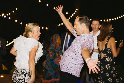 Friends dancing at Wedding at Pythian house cottage in Santa Rose