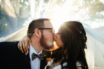 Bride and Groom Kissing at Golden Hour Wedding Day Illinois