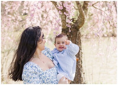 Mom holding her baby girl during an outdoor session at North Park which is located in Wexford PA