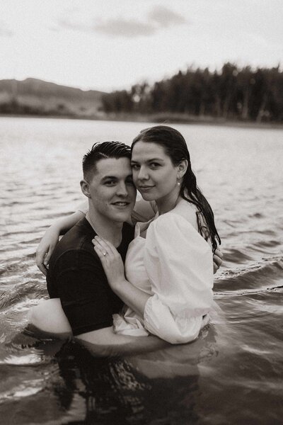 cute-couple-smiling-in-water