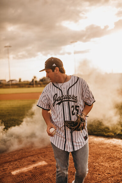 Baseball senior photos smoke bomb
