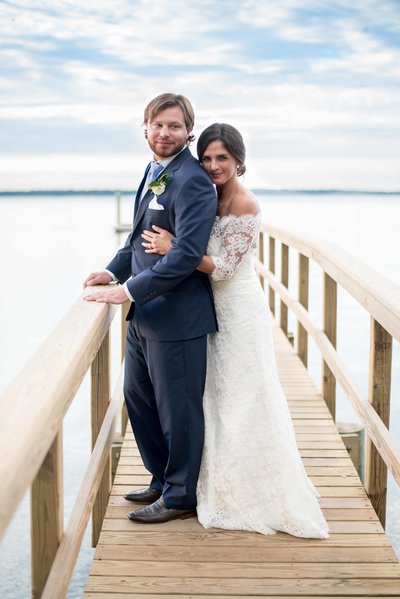 Bride and groom on dock after wedding on Hilton Head, SC