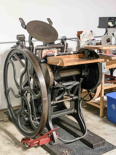 Vintage printing press at Copper Willow Paper Studio
